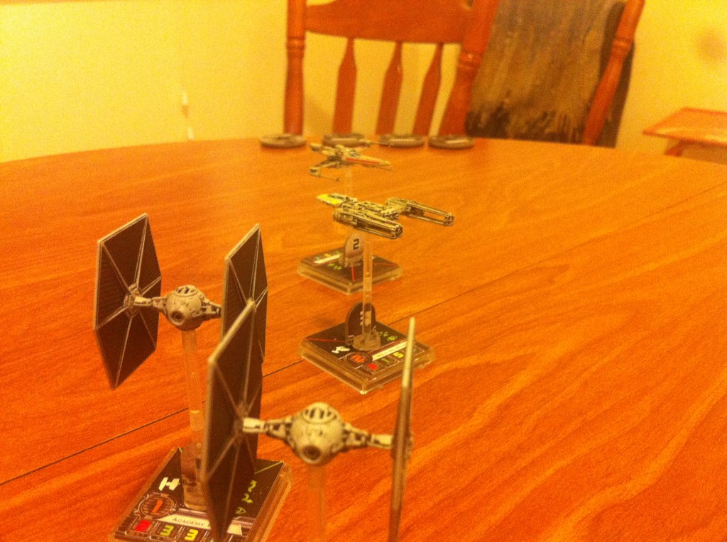 TIE Fighters bear down on Scout Three.